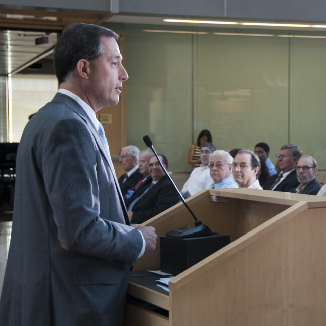 Jeffrey Shuren stands at a podium as the audience listens. -- health tech coverage from STAT