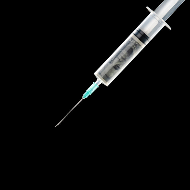 money in syringe vaccine