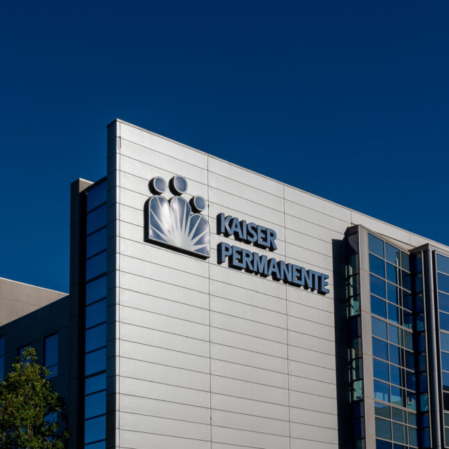 An office building with Kaiser Permanente's logo — hospitals coverage from STAT