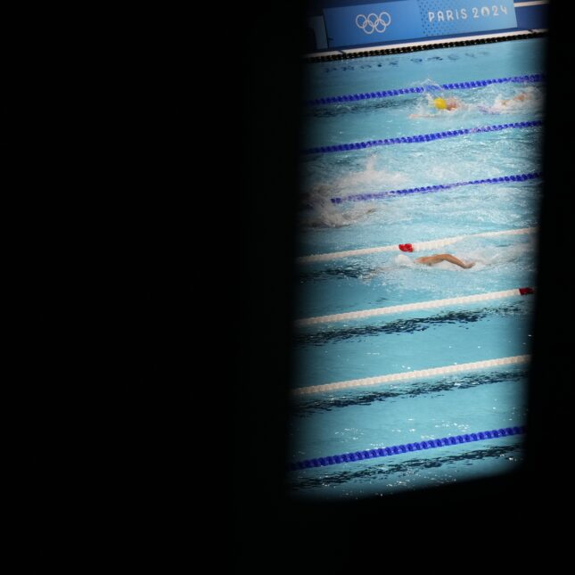 News photograph of Swimmers competed during heat three in the men's 800-meter freestyleat the 2024 Summer Olympics, Monday, July 29, 2024, in Nanterre, France.