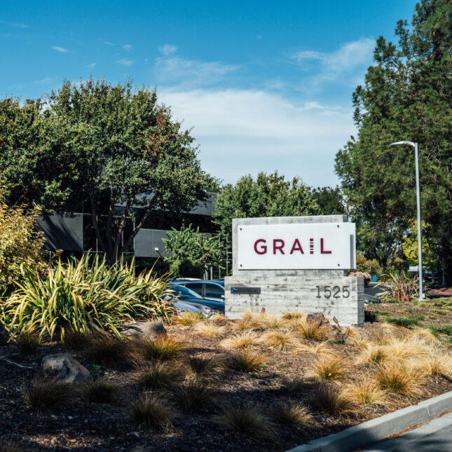 The signage of Grail, a biotechnology company, stands between road verges — biotech coverage from STAT