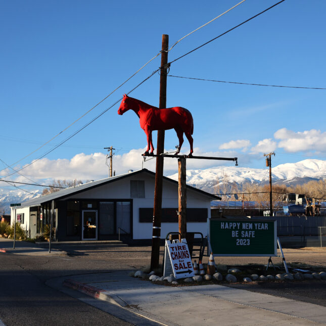 A photograph of businesses in the rural town of Bishop, California where medicare advantage plans have been advertised despite no in-network providers being available within several hundred miles.