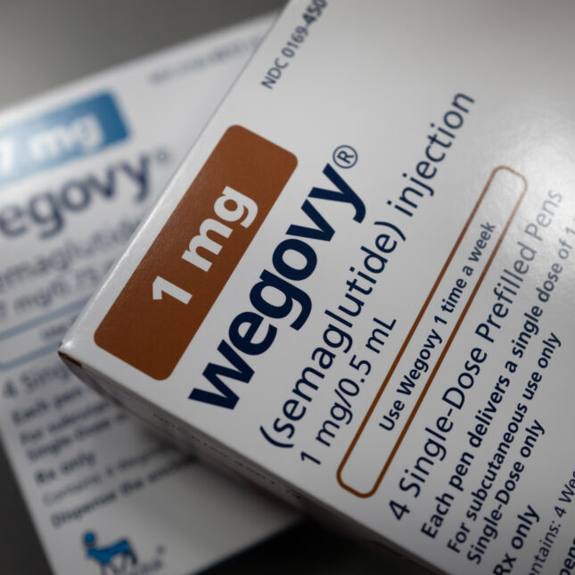 A box of Wegovy's 1 mg pen is stacked on a box of Wegovy's 1.7 mg pen — first opinion coverage from STAT